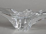 a glass vase that is sitting on a table