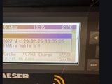 an image of a machine that has a message on the screen
