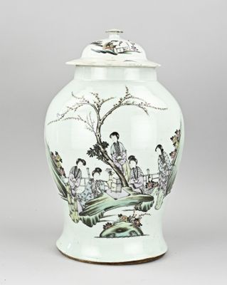 an image of a green and white vase with a painting on it