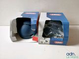 two boxes with a blue mouse inside of them sitting on a table