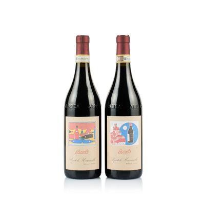 deux bouteilles de vin rouge posées l'une à côté de l'autre sur une surface blanche