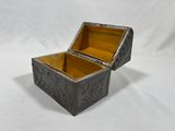 a silver and gold box on a white background