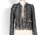 veste en tweed posée sur un mannequin, exposée sur fond blanc