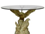 an image of a glass table with a bird on it