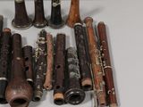 a lot of musical instruments that are sitting on a table
