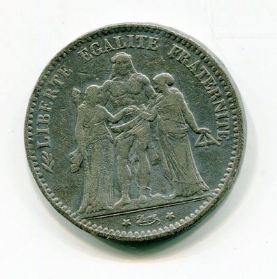 une vieille pièce de monnaie représentant un homme et une femme