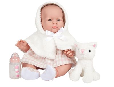 a baby doll that is sitting next to a stuffed animal
