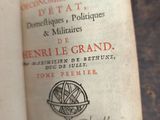 an old book with a picture of a compass on it