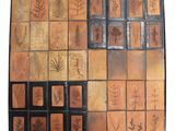 a picture of a tile with different designs on it