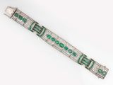 an art deco emerald and diamond bracelet