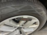 a close up of a tire with a sticker on it