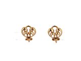 a pair of gold earrings on a white background