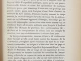 an open book with a black and white image of a clock on it