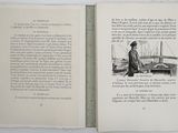 a open book with a picture of a man sitting on a boat