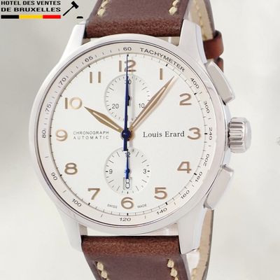 a close up of a wrist watch with a brown leather strap