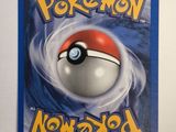 a close up of a nintendo wii game with a pokemon ball on it