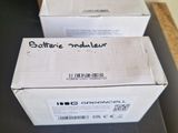 two boxes that are sitting on a table