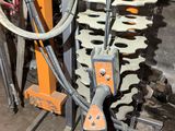 a picture of a machine that is working on a piece of machinery