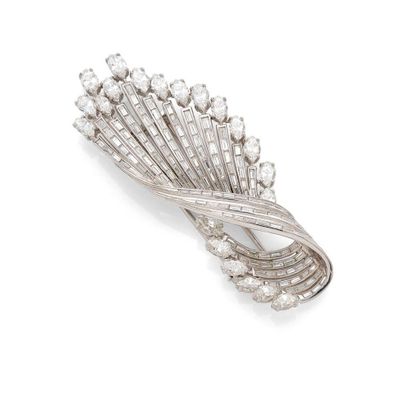 an art deco diamond and platinum - plated brooch, by van cleef