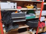 a shelf with many different items on it in a room