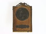a plaque with a picture of a man on it