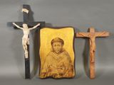 a picture of a crucif and a wooden cross