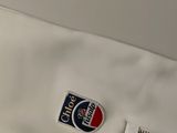 a white shirt with a pepsi logo on it