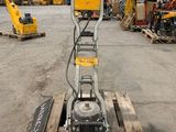 a close up of a machine on a pallet in a warehouse