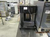 an image of a coffee machine on a counter in a store