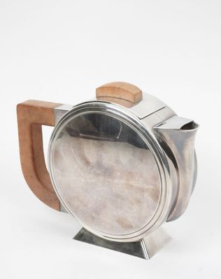 stainless steel coffee pot with wooden handle on white background