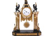 a clock that is sitting on top of a table