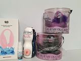 a bottle of lotion, a container of lotion, and a box of lotion on a table