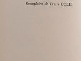 an open book with a black and white image on it