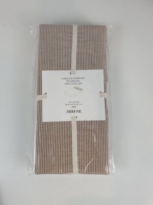 the napkins are wrapped in plastic and ready to be placed on the table