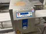 an image of a conveyor belt in a factory