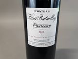 a bottle of wine that is sitting on a table