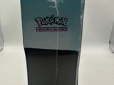 a close up of a box with a chain attached to it