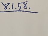 a white shirt with a blue writing on the front of it
