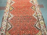 an image of a large oriental rug is on display in a store
