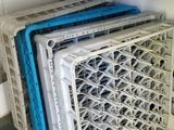 a stack of plastic crates stacked on top of each other