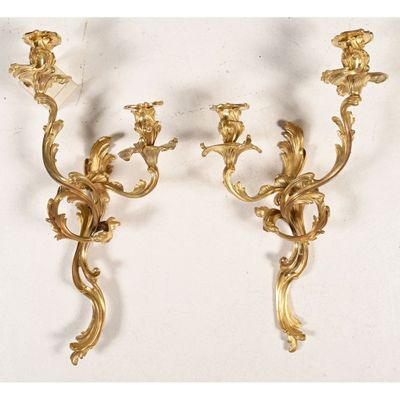 pair of antique brass wall sconces with flowers and leaves