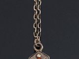 sterling silver and coral pendant on a silver chain