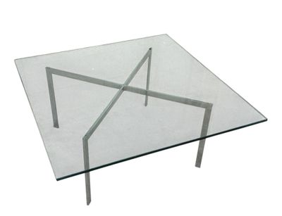 rectangular glass coffee table with metal legs and a clear glass top