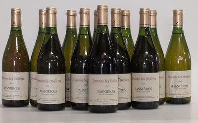 six bottles of wine are lined up in a row on a table