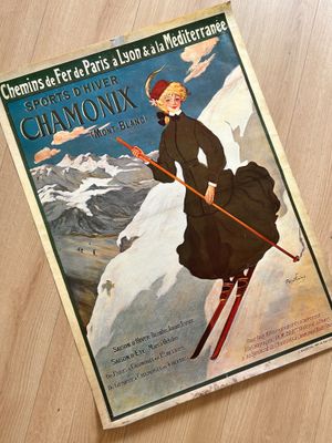 un livre dont la couverture représente une femme à skis