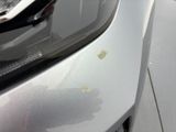 a close up view of a car ' s front bumper