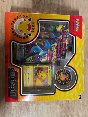 a box of pokemon cards sitting on a table