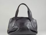 a black leather handbag on a white background
