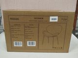 packaging of a box with a chair on top of it on a table