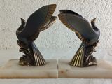 two bookends that are sitting on a table